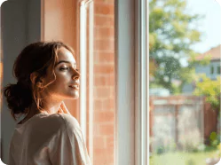 Clear bullet-resistant glass used in a residential property's windows, offering discreet security for homeowners.